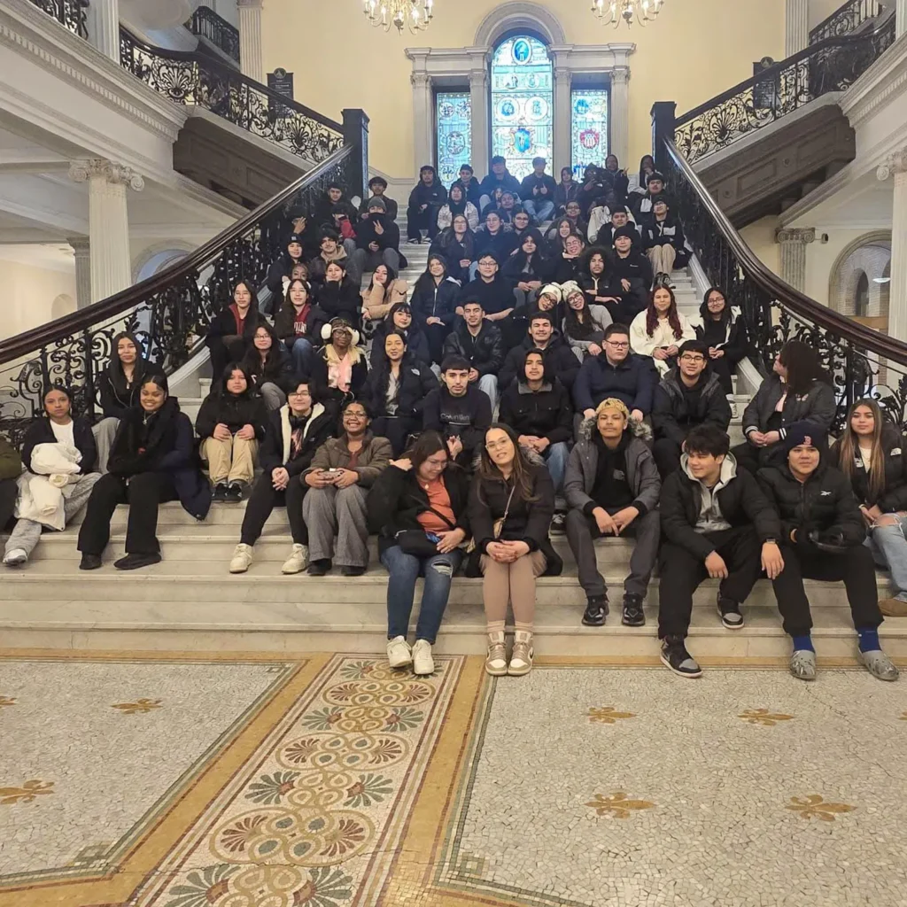 Youth sitting on a staircase