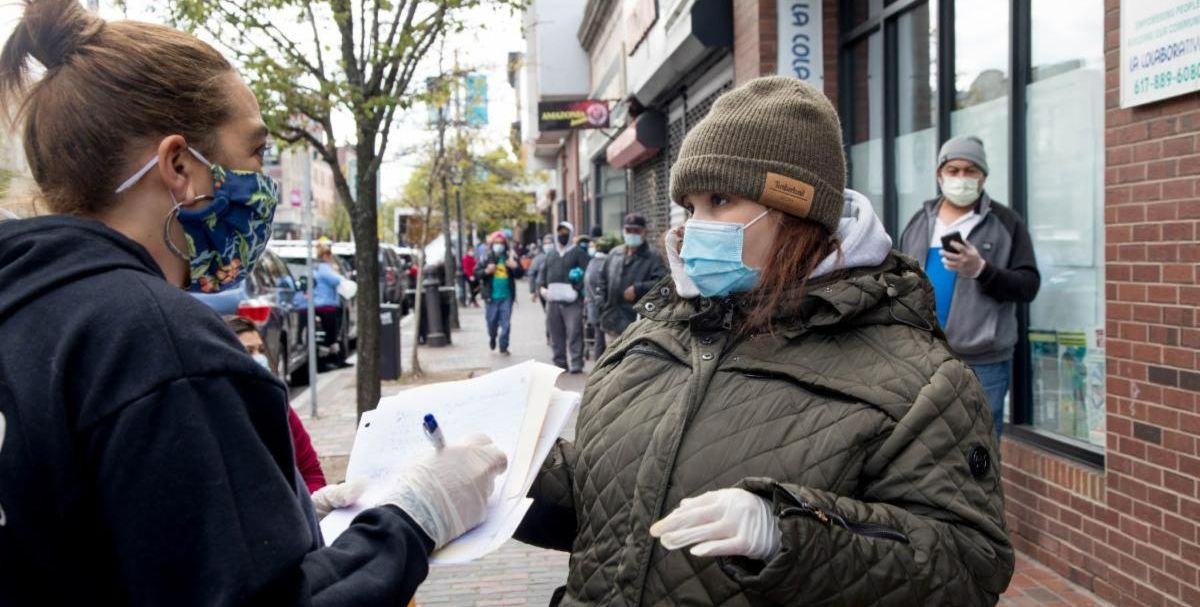 Community member being interviewed Covid