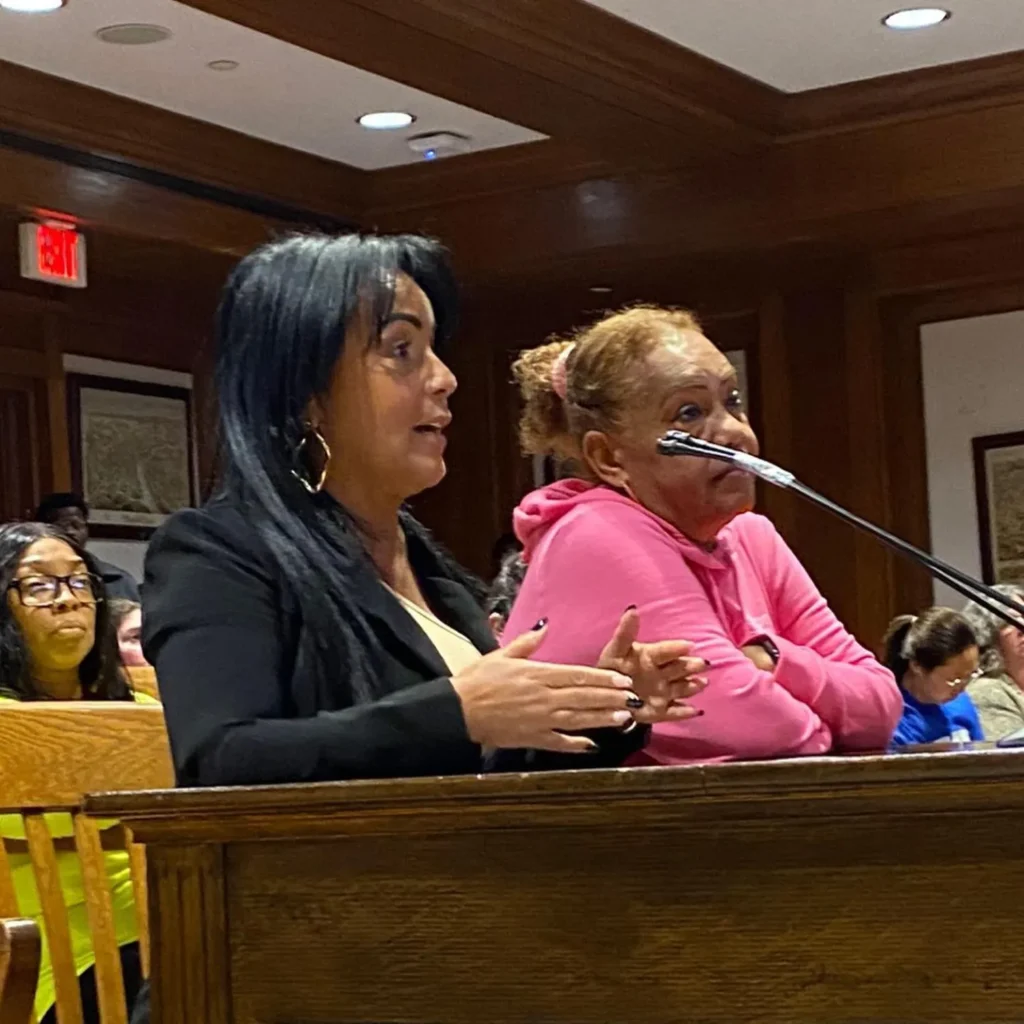 Gladys Vega speaking to a committee